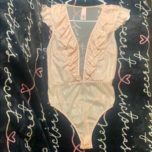 Victoria’s Secret coral body with golden stripes